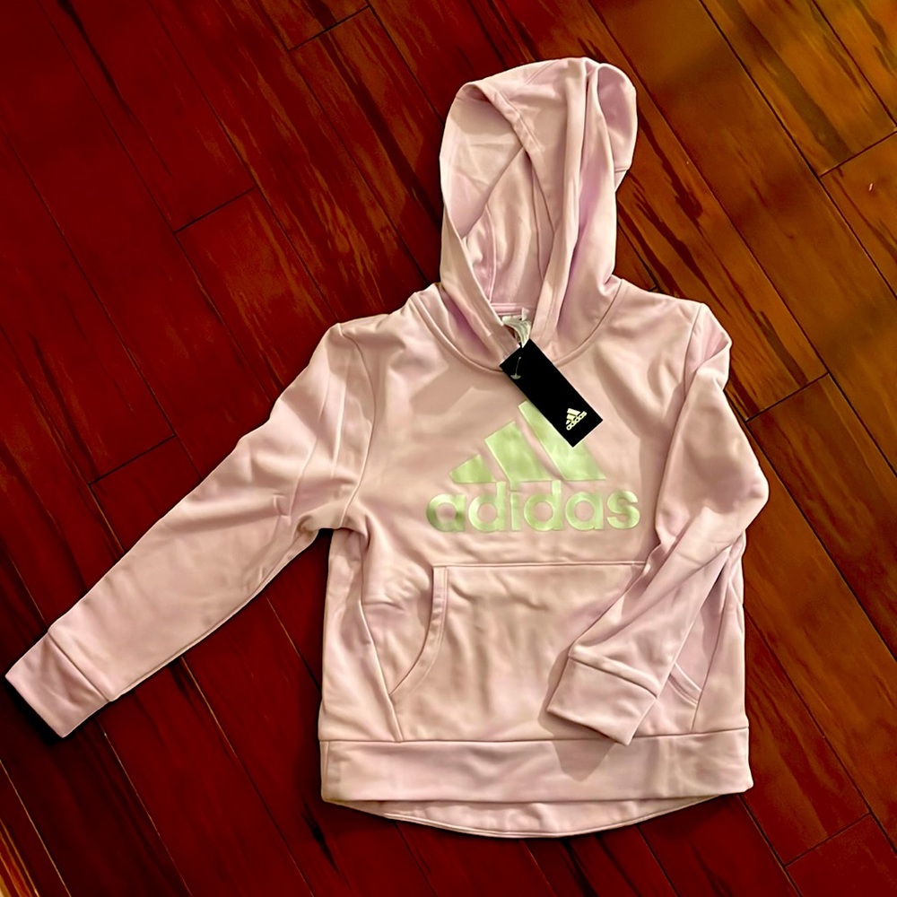 Brand new with tags Adidas Sweatshirt! It’s a 10-12 but runs a little small.